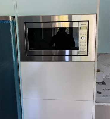 microwave-with-trim-kit installation in Surrey
